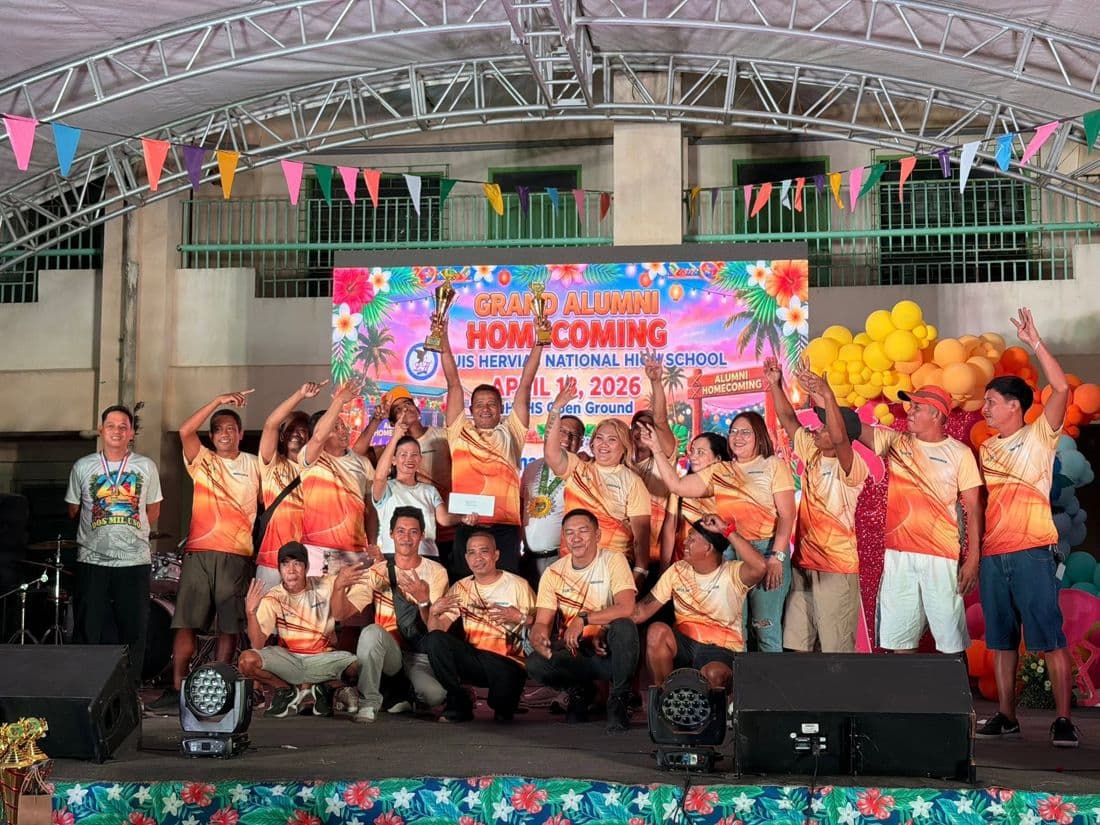 The undefeated Batch ’98 team raising their trophies