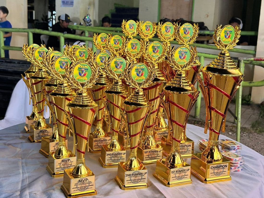 Rows of NIR trophies for the homecoming tournaments